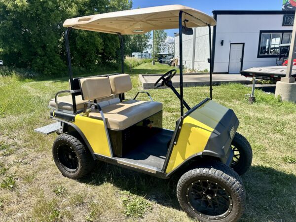 Lifted E-Z-GO Marathon Gas Golf Cart with MODZ Wheels and Sound System
