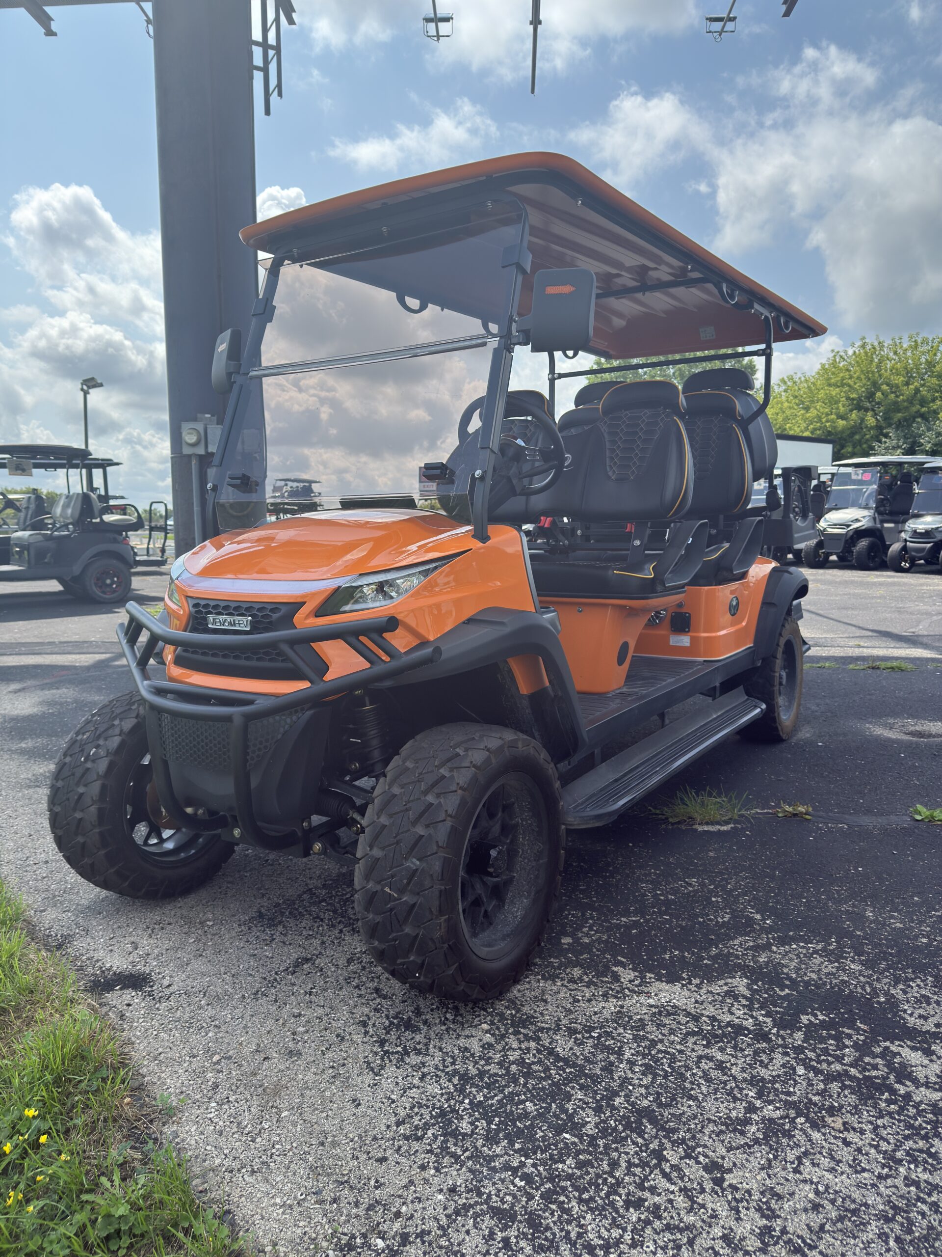 Used 2024 Venom EV Strike 6 Lifted – Orange - Image 4